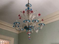 12B The writing room has a beautiful glass chandelier in a flower motif Devon House mansion Kingston Jamaica